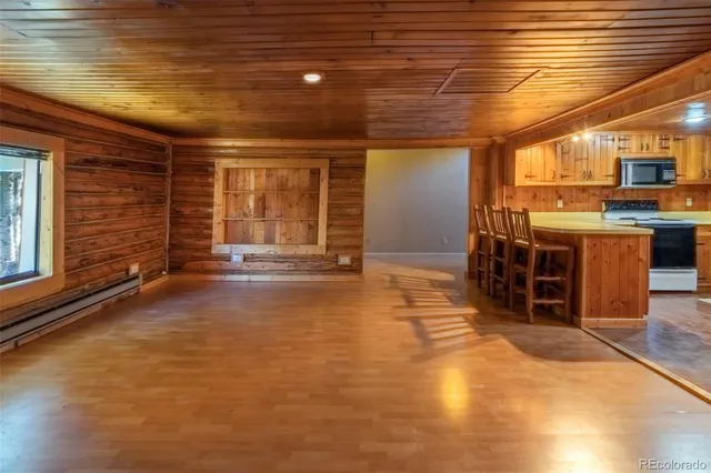 a view of a hall with chairs