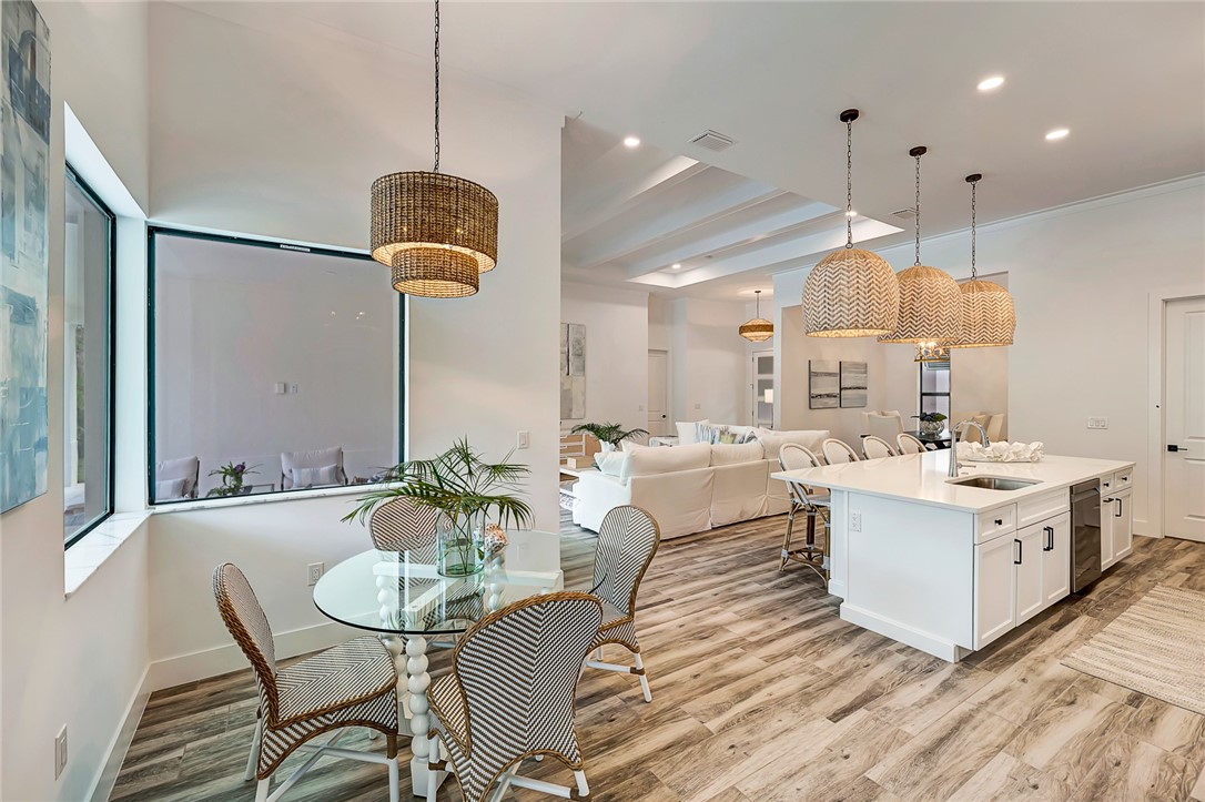 325 Holly Road Vero Beach, FL 32963 - Photo 12 of 25 a very nice looking dining room with a table and chairs