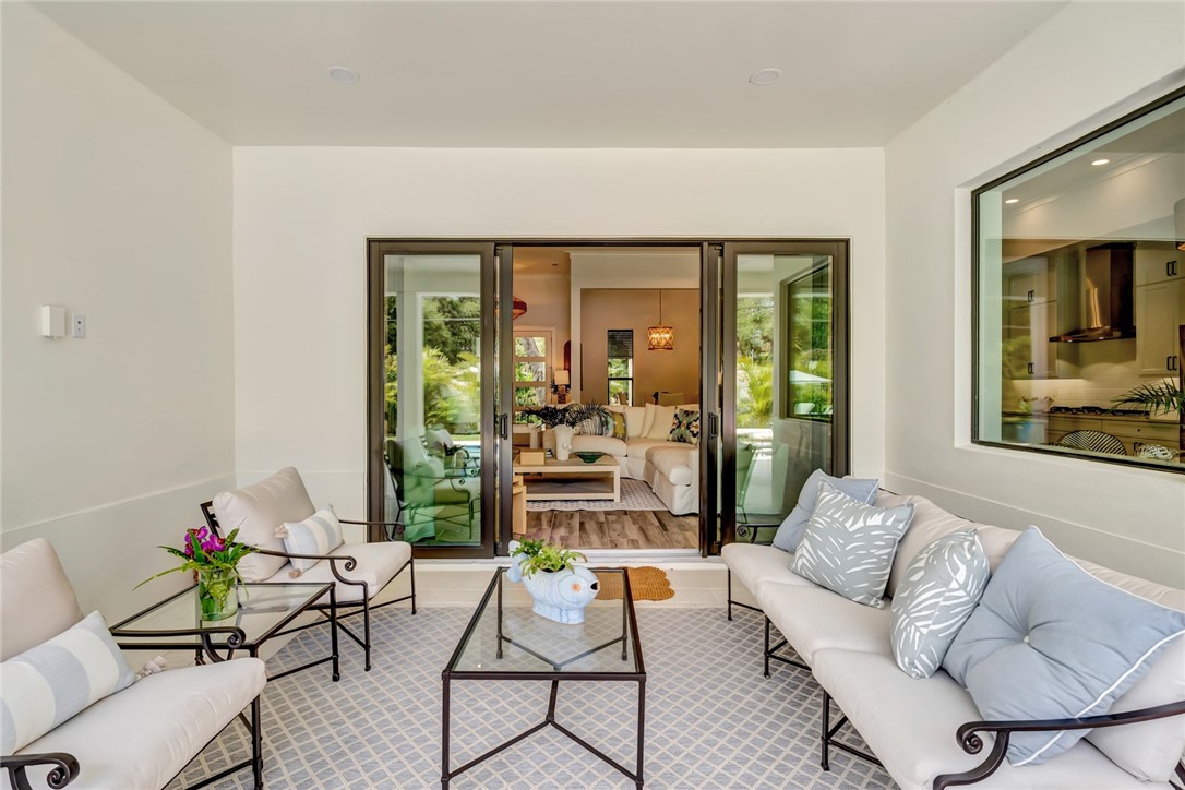 325 Holly Road Vero Beach, FL 32963 - Photo 22 of 25 a living room with furniture and a large window
