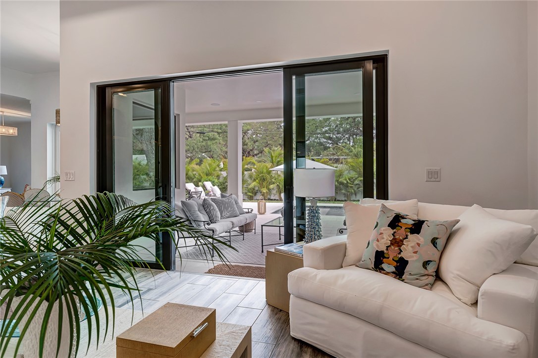 325 Holly Road Vero Beach, FL 32963 - Photo 6 of 25 a living room with furniture and a large window