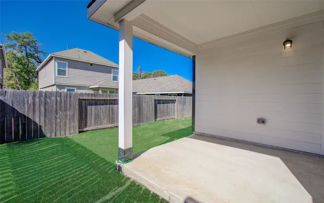 a view of a backyard with a garden and plants