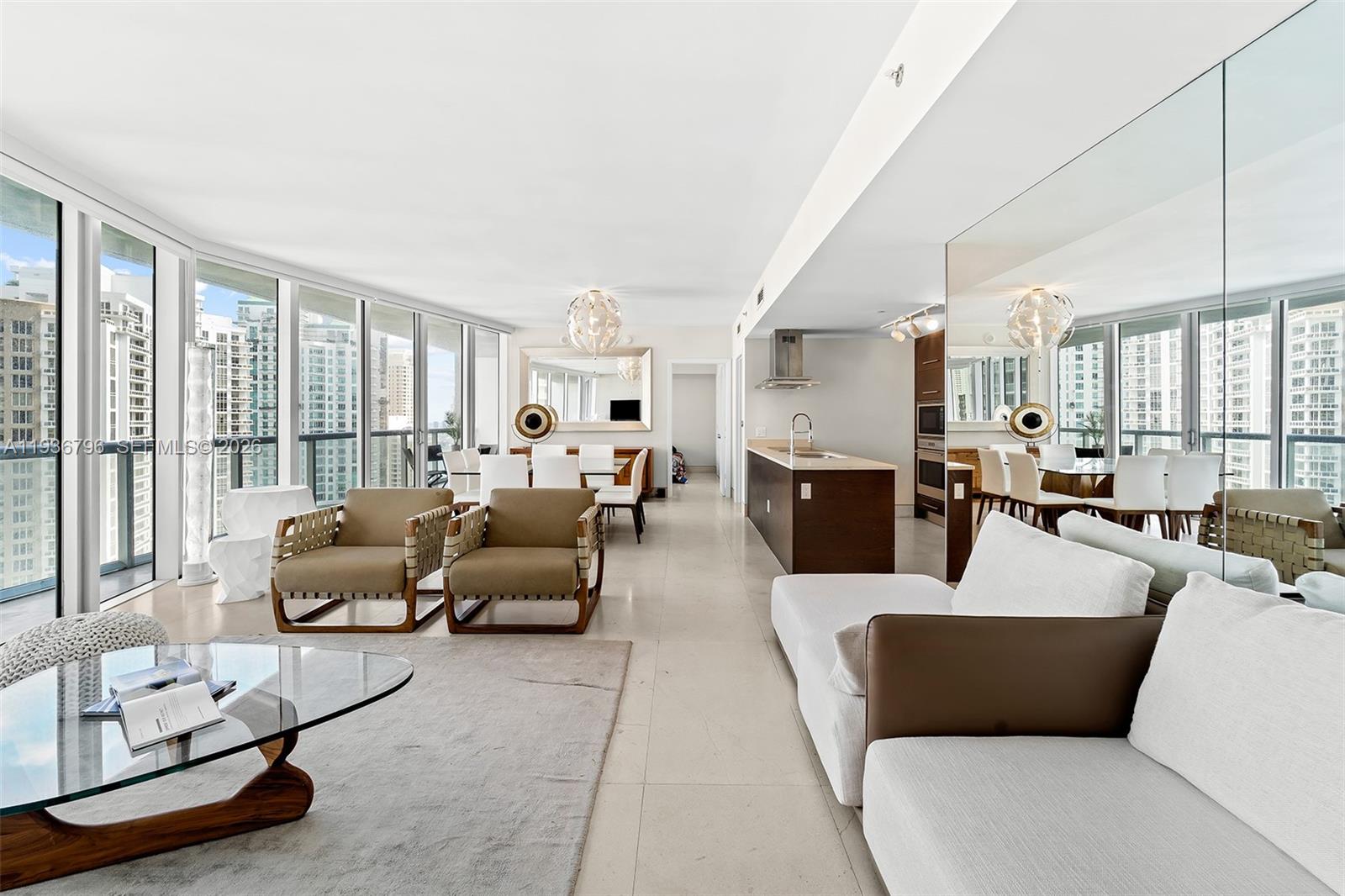495 Brickell Avenue, Unit 2904 Miami, FL 33131 - Photo 1 of 29 a living room with furniture and a large window