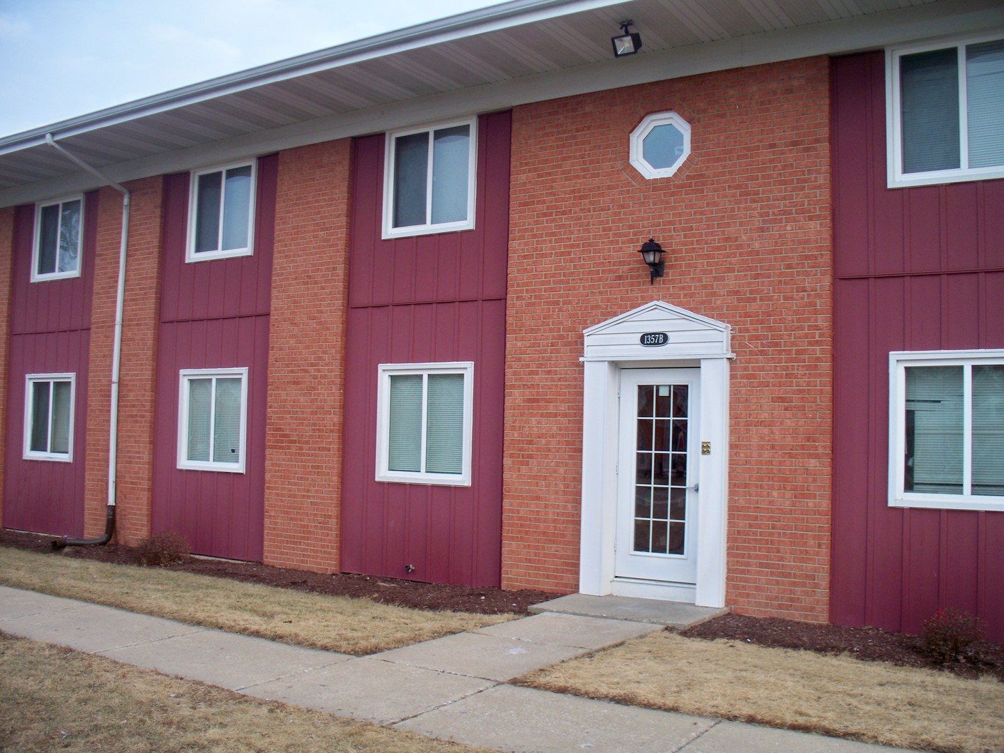 1357 Monomoy Street, Unit B1 Aurora, IL 60506 - Photo 1 of 8 a front view of a house