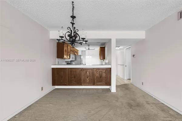 $169,000 | 6321 Coral Lake Drive, Unit 209, Margate, FL 33063