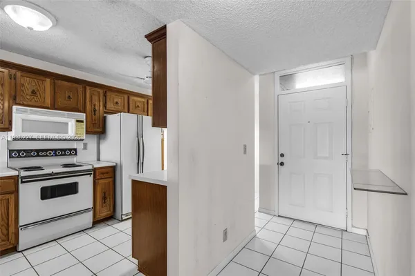 $169,000 | 6321 Coral Lake Drive, Unit 209, Margate, FL 33063