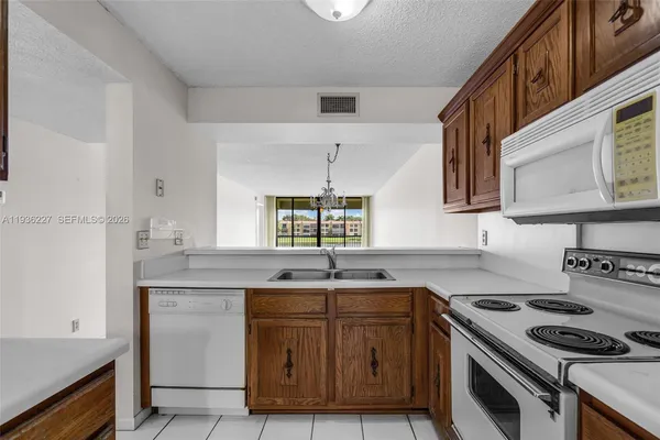 $169,000 | 6321 Coral Lake Drive, Unit 209, Margate, FL 33063