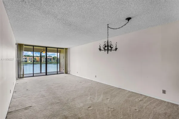 $169,000 | 6321 Coral Lake Drive, Unit 209, Margate, FL 33063