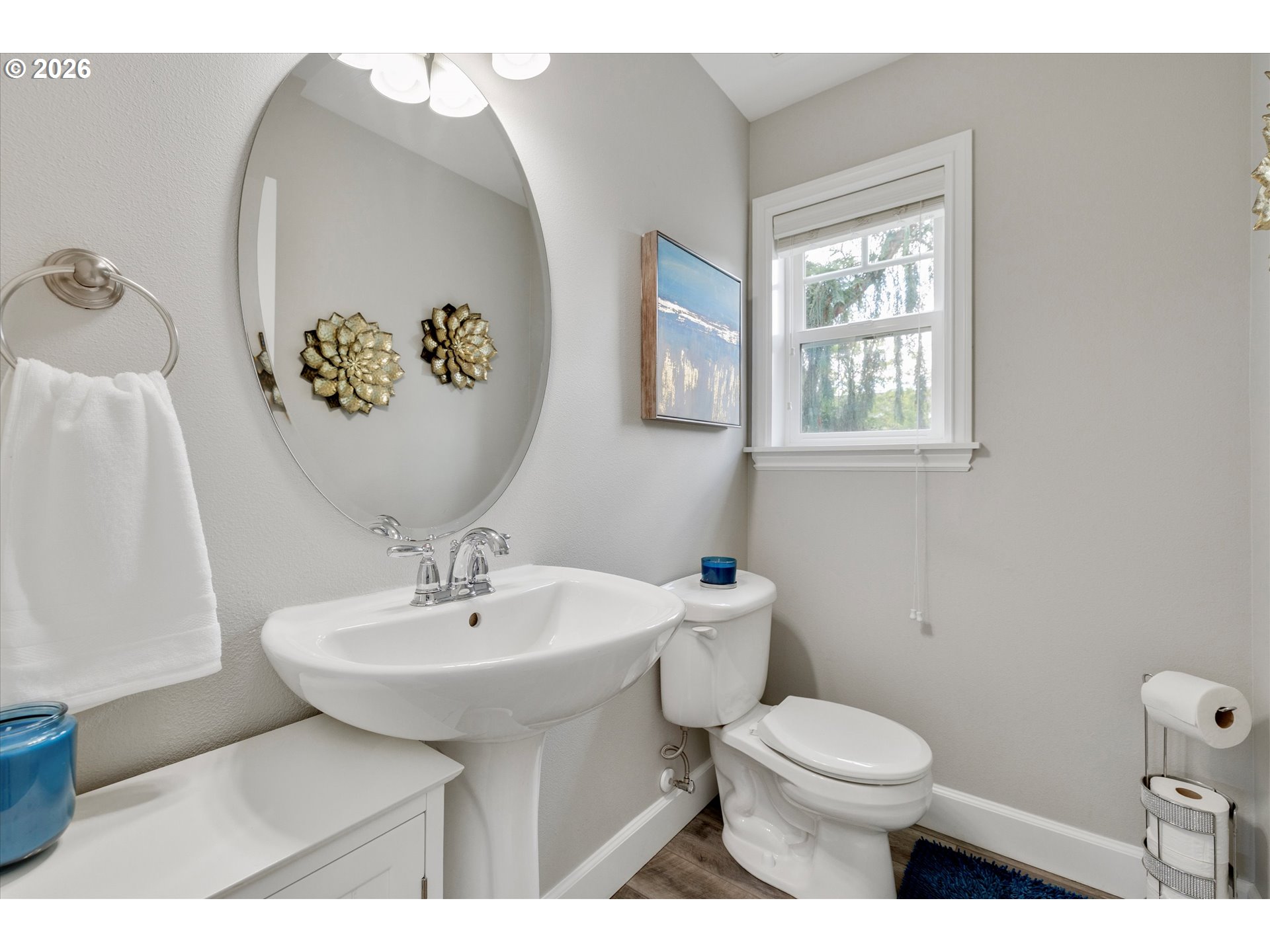 3769 10th Street Hubbard, OR 97032 - Photo 16 of 47 a bathroom with a sink mirror and toilet