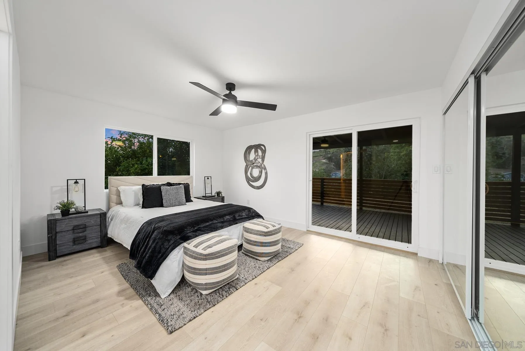11442 Pinehurst Drive Lakeside, CA 92040 - Photo 25 of 46 a spacious bedroom with a bed and a large window