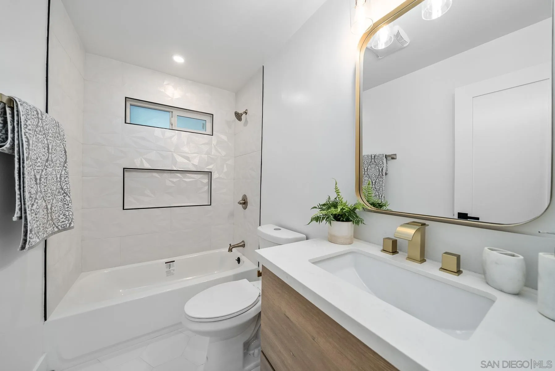 11442 Pinehurst Drive Lakeside, CA 92040 - Photo 27 of 46 a bathroom with a granite countertop sink mirror vanity and toilet