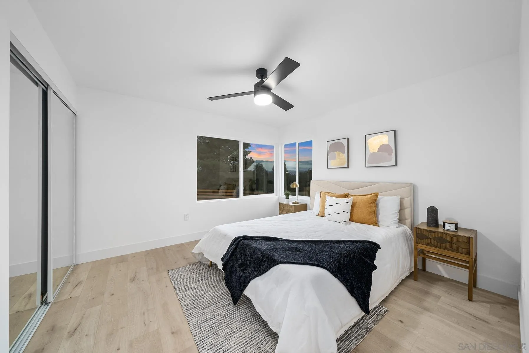 11442 Pinehurst Drive Lakeside, CA 92040 - Photo 29 of 46 a bedroom with a bed and wooden floor