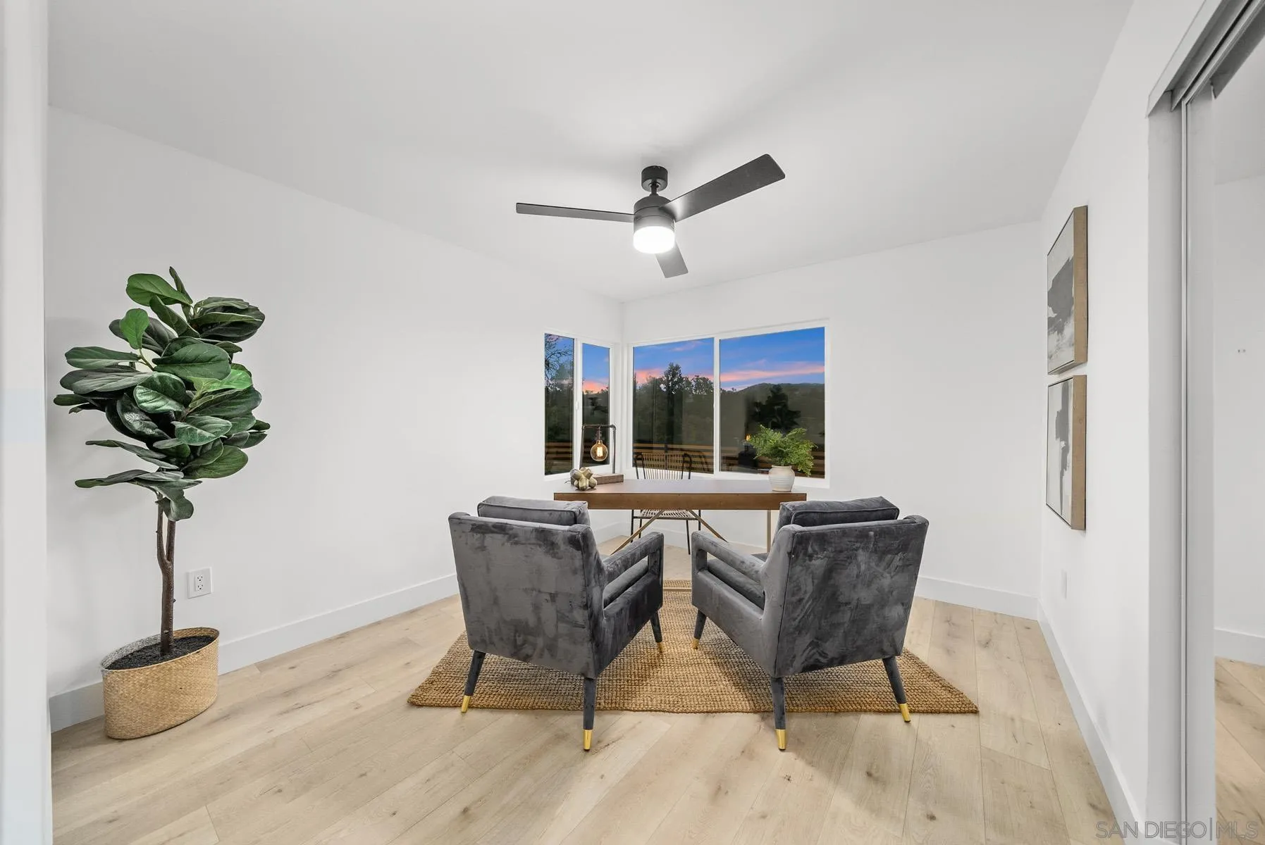 11442 Pinehurst Drive Lakeside, CA 92040 - Photo 30 of 46 a dining room with furniture a potted plant and a window