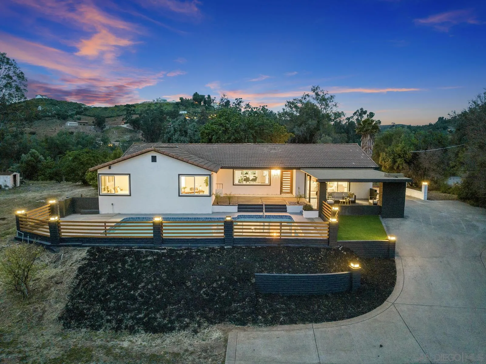 11442 Pinehurst Drive Lakeside, CA 92040 - Photo 3 of 46 a view of a house with pool and a yard