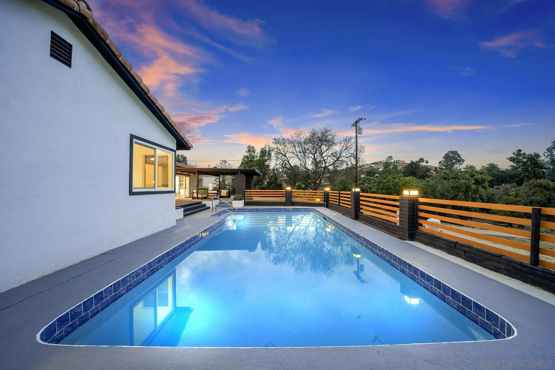 11442 Pinehurst Drive Lakeside, CA 92040 - Photo 36 of 46 a view of a swimming pool with a lounge chairs