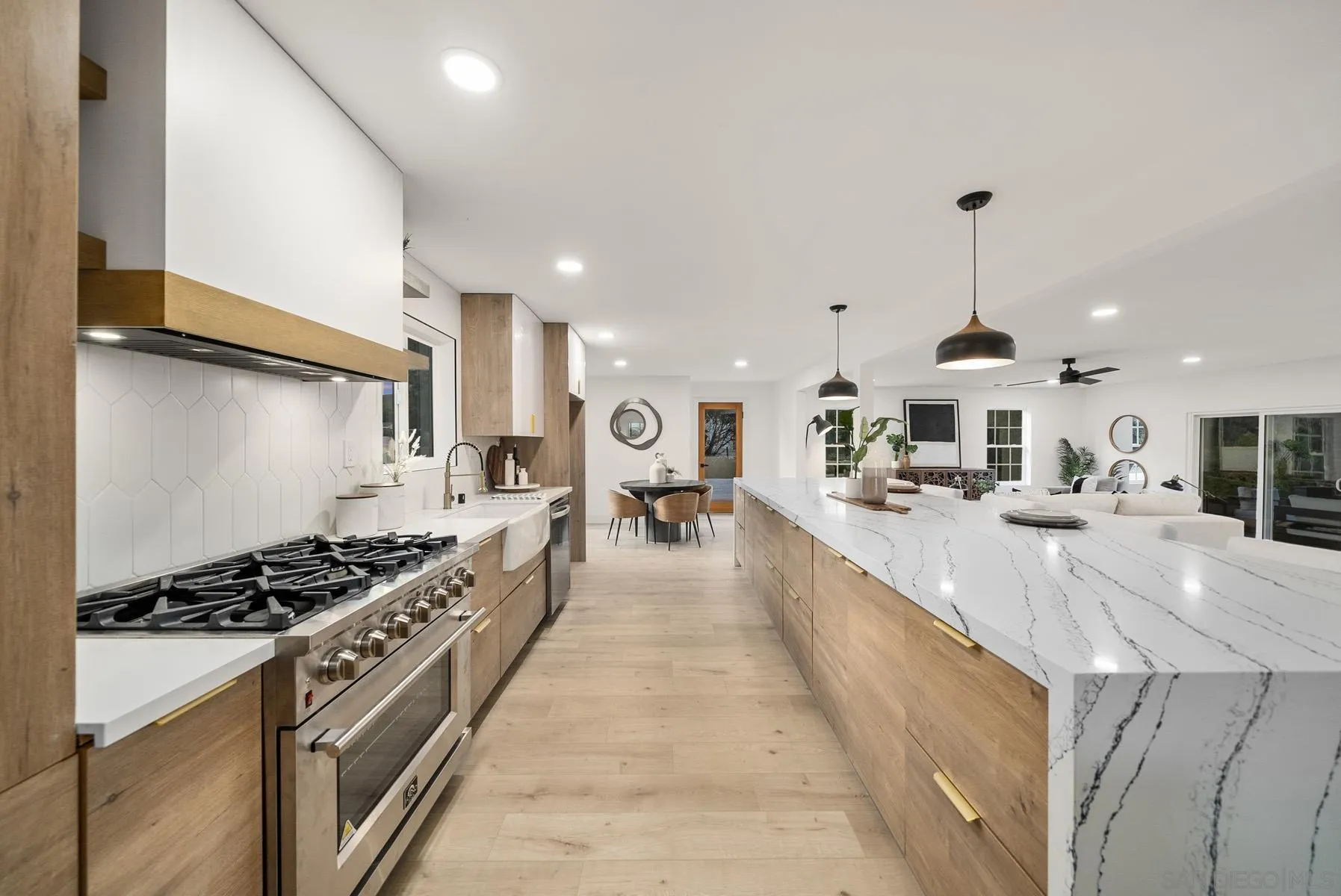11442 Pinehurst Drive Lakeside, CA 92040 - Photo 9 of 46 a large kitchen with stainless steel appliances granite countertop a lot of counter space and a sink