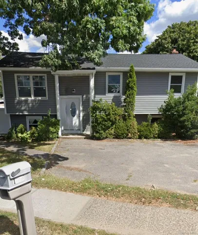 front view of house with a yard