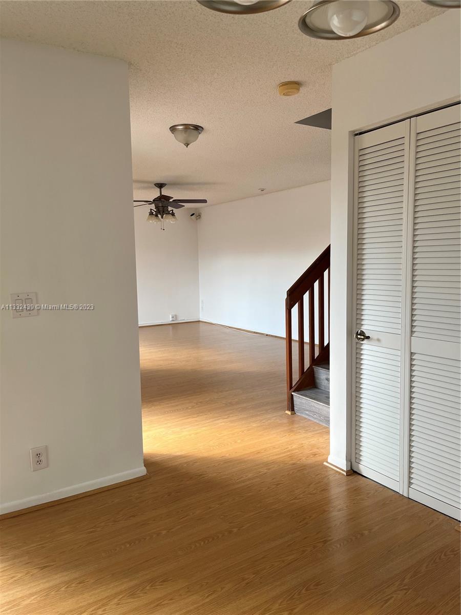 7657 Courtyard Run West, Unit 7657 Boca Raton, FL 33433 - Photo 13 of 36 a view of a room with wooden floor