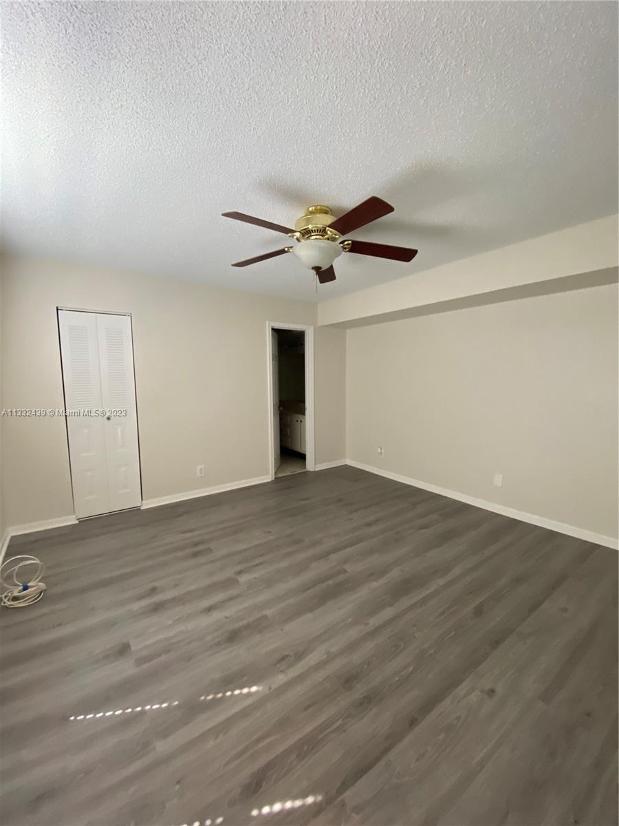 7657 Courtyard Run West, Unit 7657 Boca Raton, FL 33433 - Photo 24 of 36 a view of an empty room
