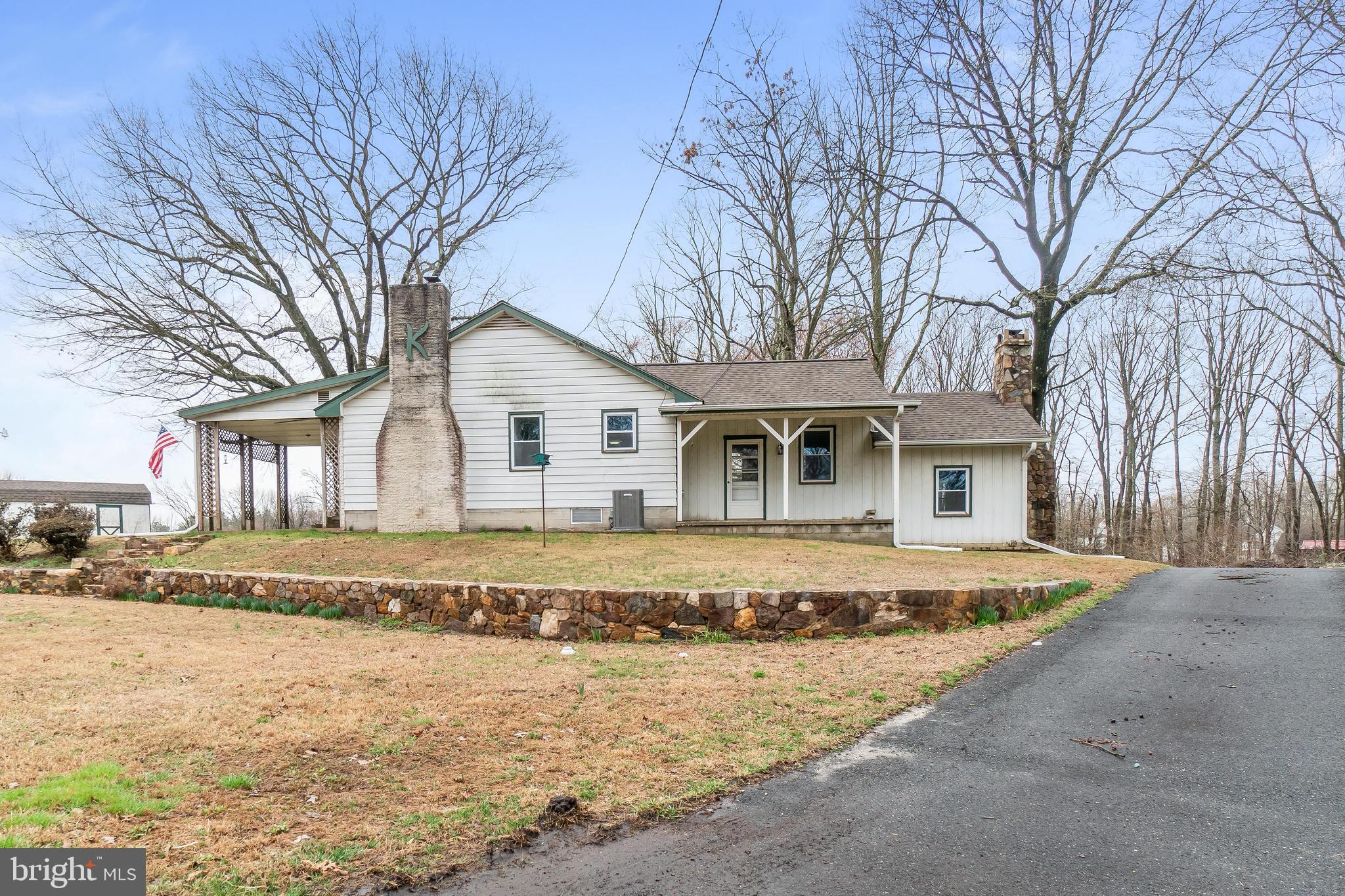 601 Red Toad Road North East, MD 21901 - Photo 22 of 25 Side view showing basement & living room chimney