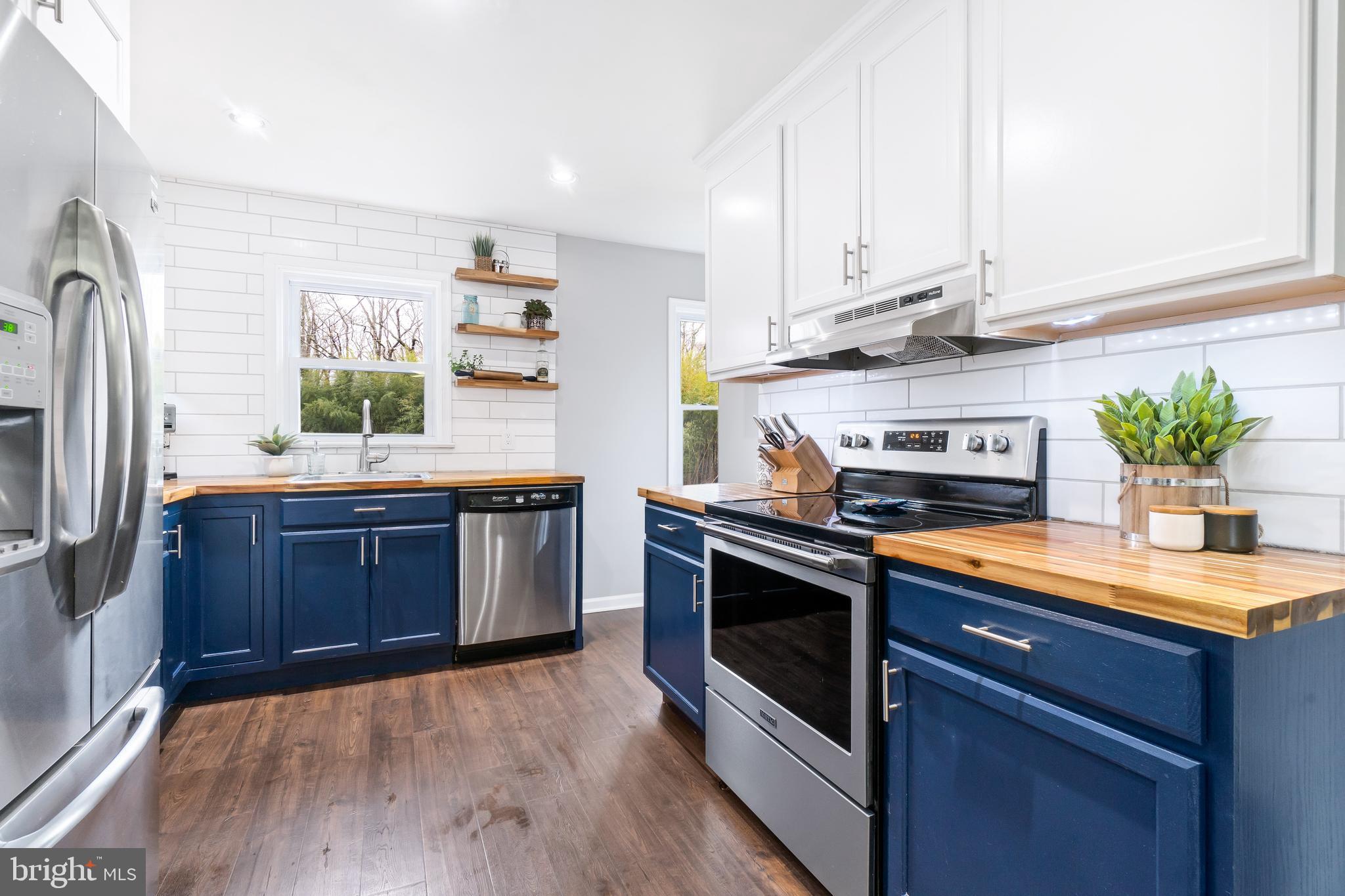 601 Red Toad Road North East, MD 21901 - Photo 8 of 25 Butcher block countertops & two-tone cabinets