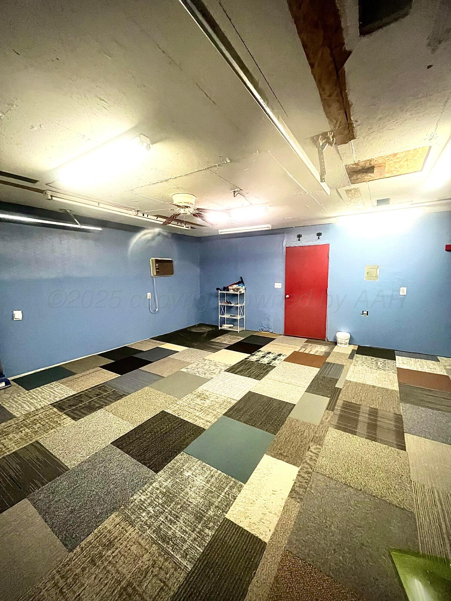 5116 Crockett Street Amarillo, TX 79110 - Photo 23 of 23 a bedroom with a bed and a night stand