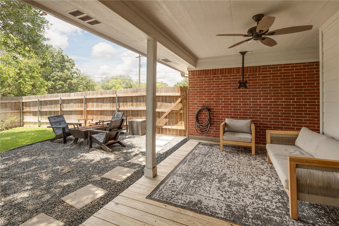 4700 Kensington Road Bryan, TX 77802 - Photo 24 of 31 Covered patio featuring a wood-finish deck and ceiling fan