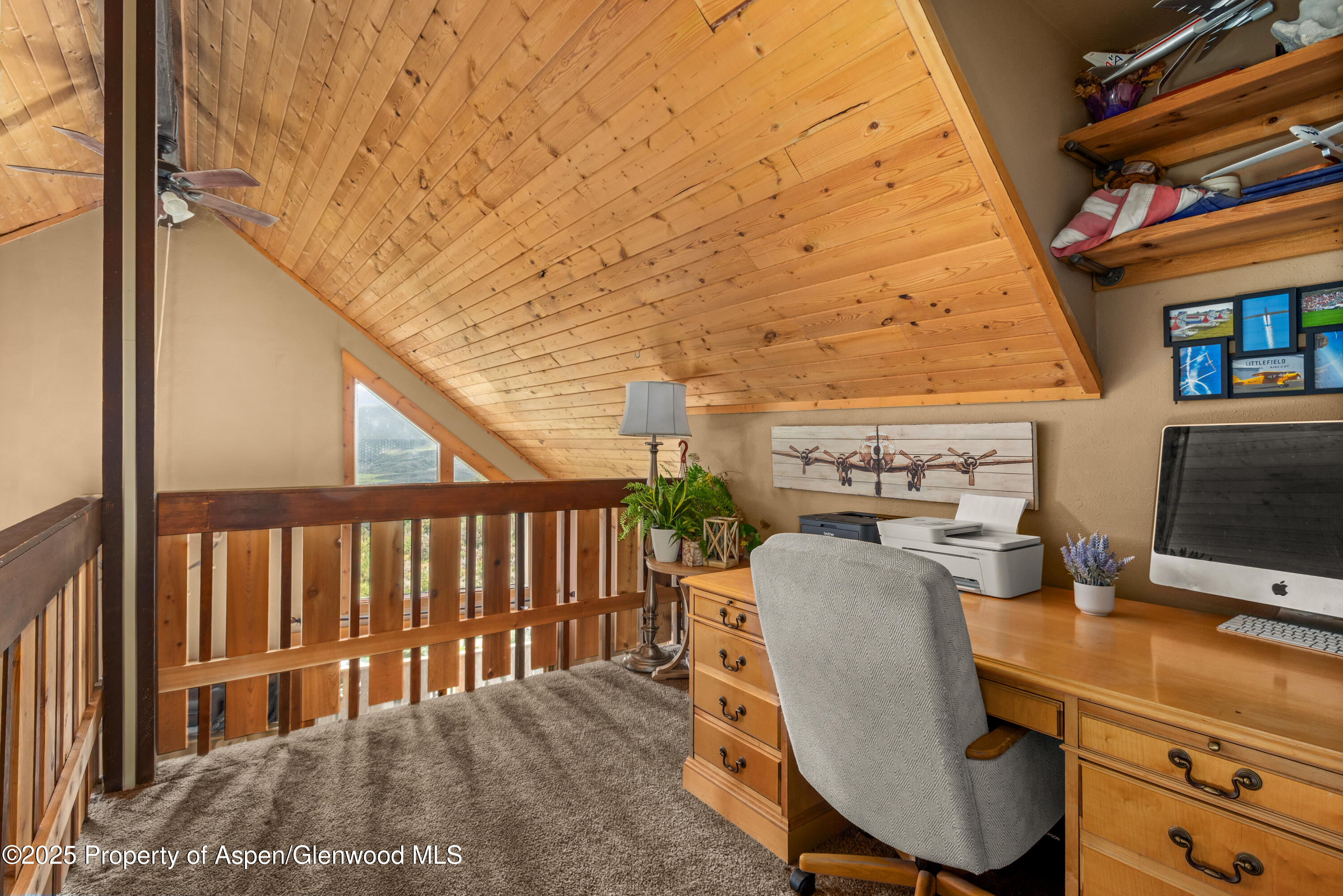 614 Light Hill Road Snowmass, CO 81654 - Photo 17 of 22 a balcony with table and chairs