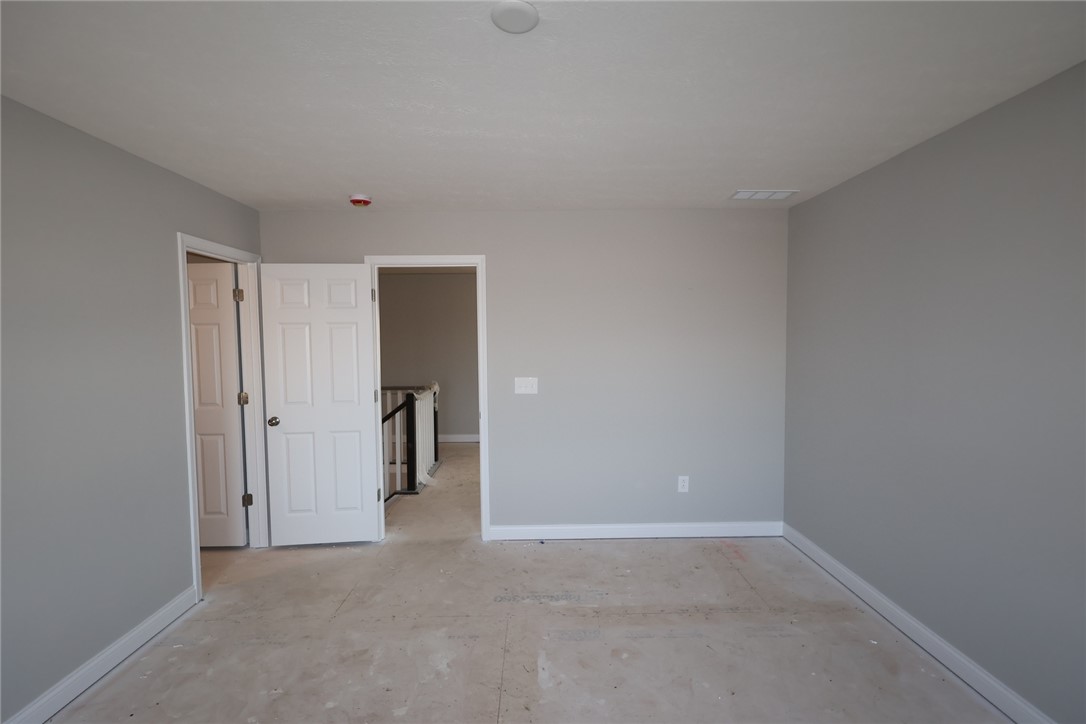 230 Tilly Court, Unit 4 Springboro, OH 45066 - Photo 14 of 20 This versatile space features a doorway to the stairs, offering flexible design possibilities.