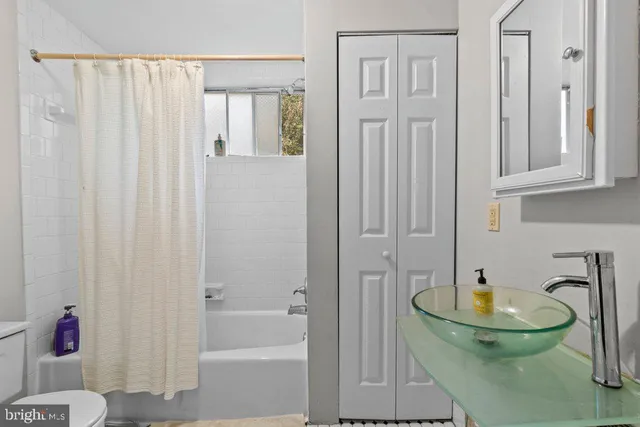 a bathroom with a sink and a toilet