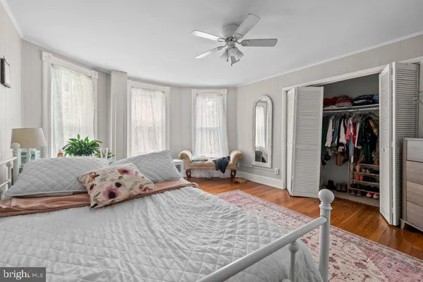 a bed room with a bed and a couch