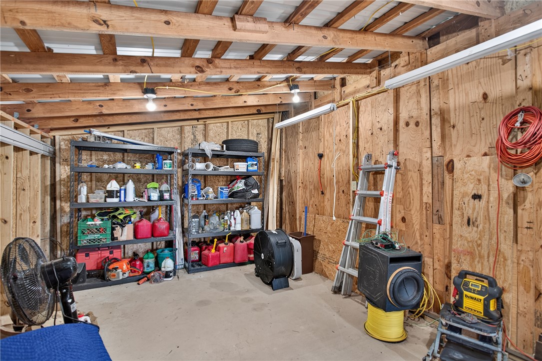 120 Coneross Knob Drive Seneca, SC 29678 - Photo 10 of 37 The barn shop features exposed wooden beams and durable concrete flooring.