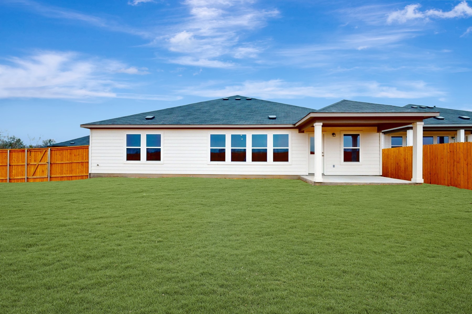 20017 Schatz Way Manor, TX 78653 - Photo 33 of 34 a front view of a house with a garden