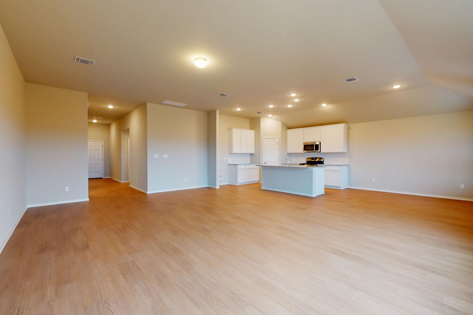 20017 Schatz Way Manor, TX 78653 - Photo 7 of 34 a view of large hall with wooden floor