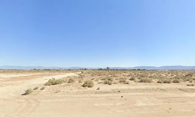 a view of beach and ocean