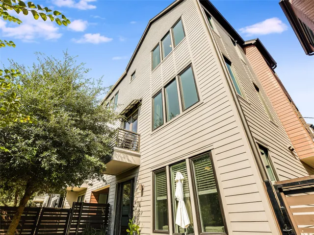 a view of a house with a large window