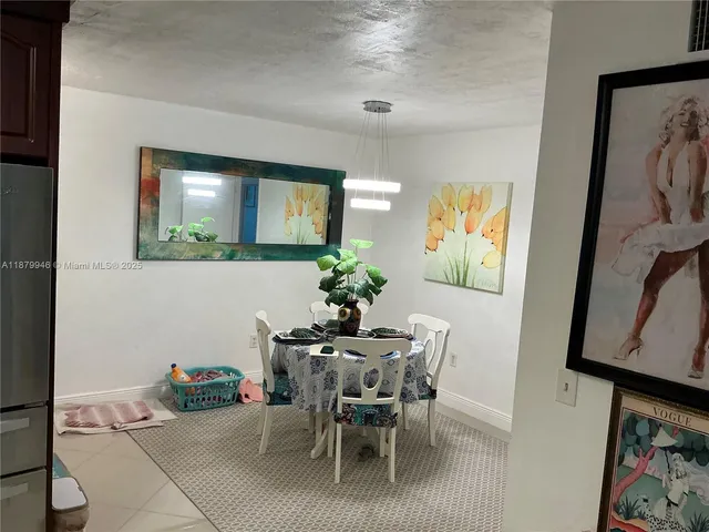 a view of a bathroom from a hallway