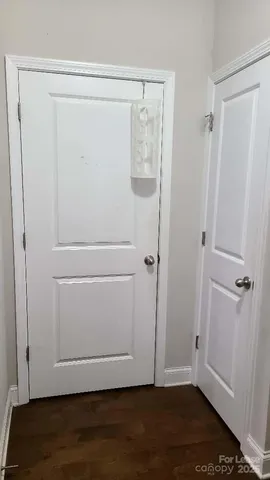 a view of small space with wooden floor