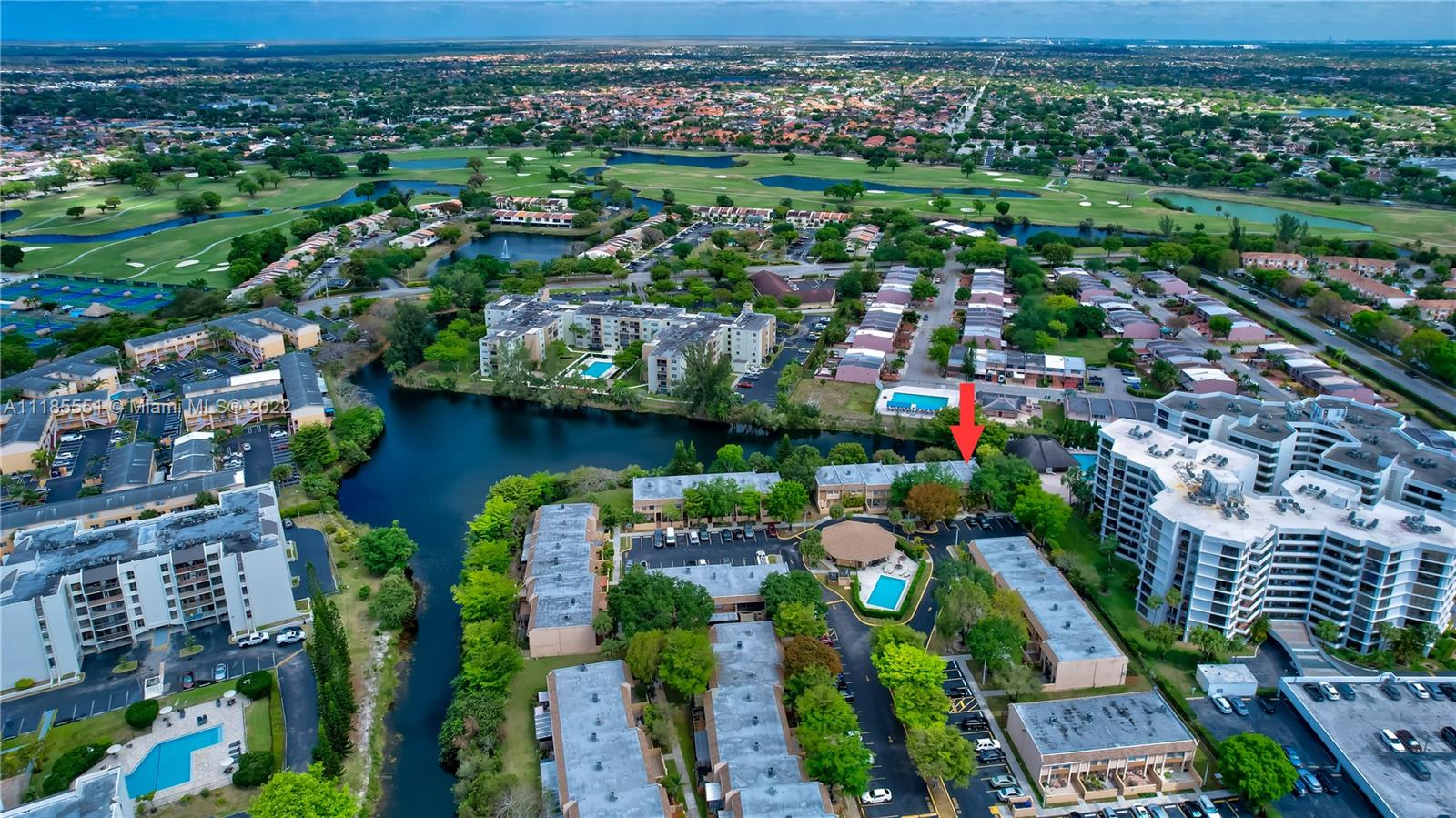 14107 Southwest 66th Street, Unit D7 Miami, FL 33183 - Photo 32 of 38 an aerial view of lake and residential houses