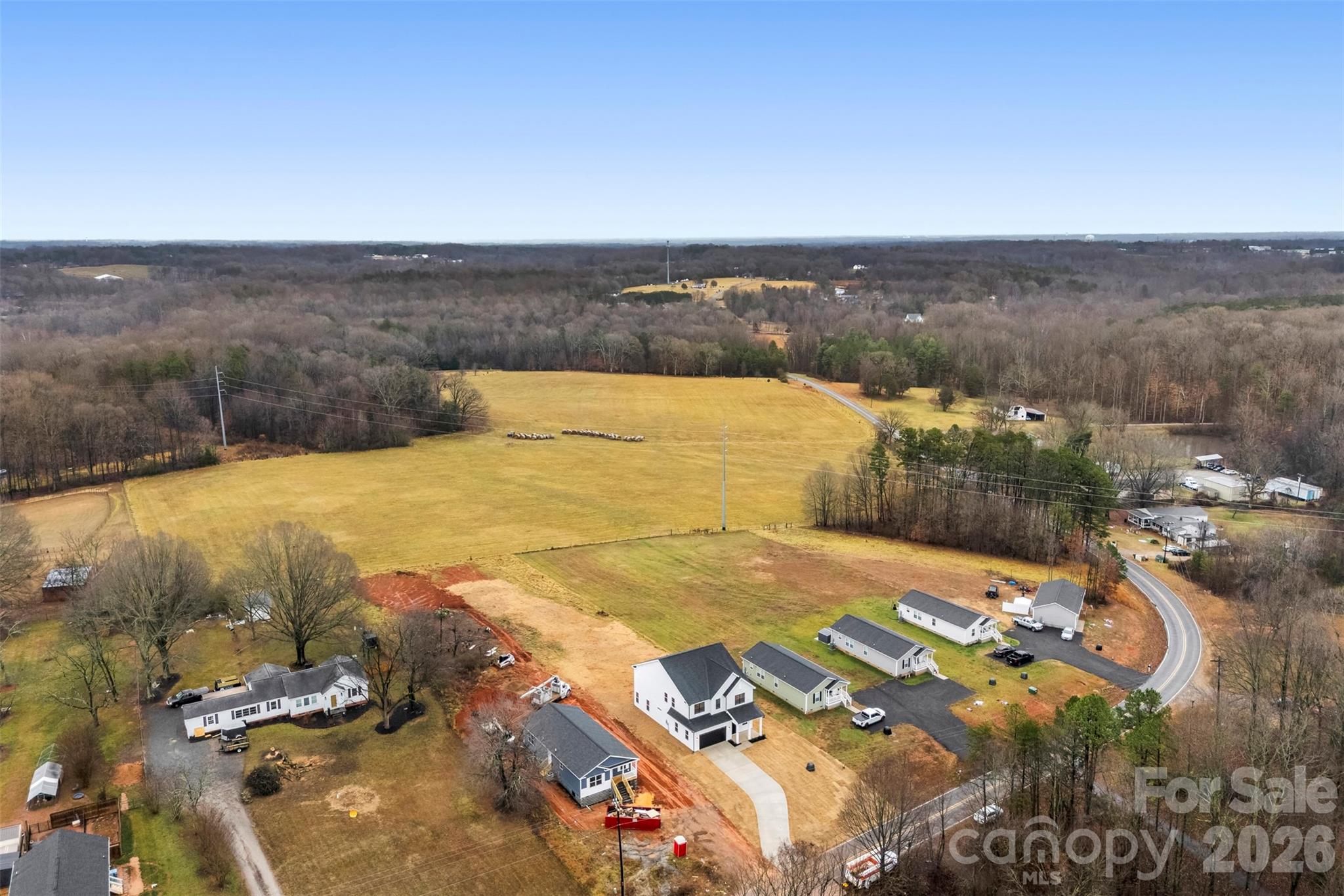 551 Perry Road Troutman, NC 28166 - Photo 46 of 47 an aerial view of residential houses with outdoor space