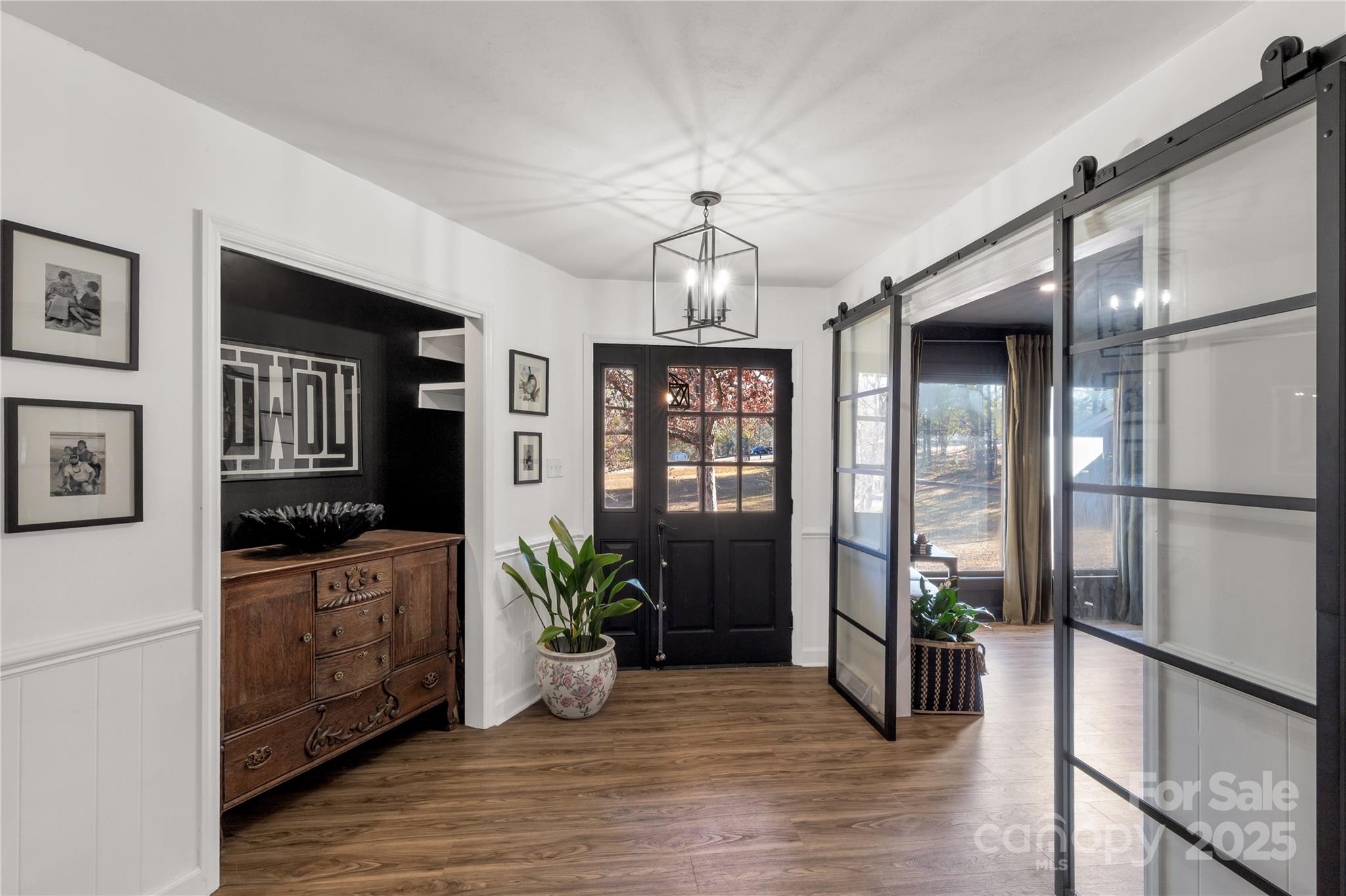 2570 Pineview Drive Lancaster, SC 29720 - Photo 8 of 43 a view of a hallway with wooden floor and a potted plant