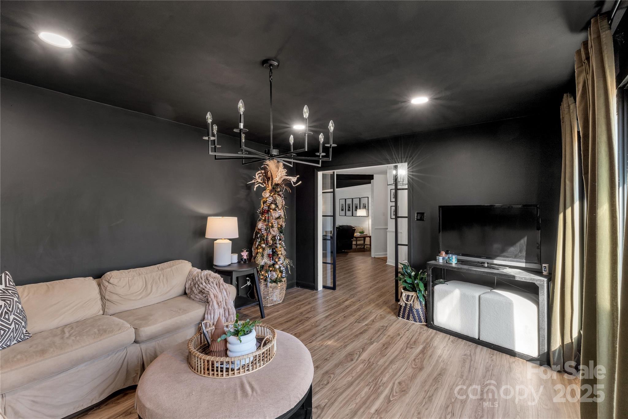 2570 Pineview Drive Lancaster, SC 29720 - Photo 10 of 43 a living room with furniture and a chandelier