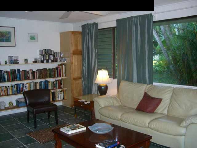 151 Kahiapo Place Haiku, HI 96708 - Photo 11 of 13 a living room with furniture and a window