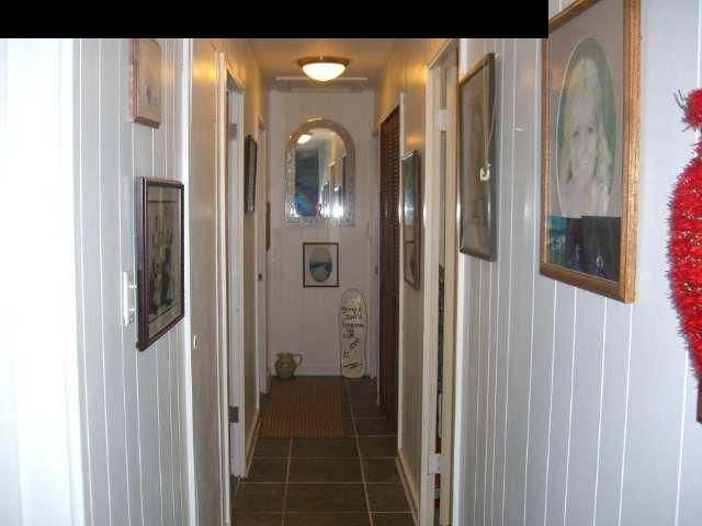151 Kahiapo Place Haiku, HI 96708 - Photo 9 of 13 a bathroom with a glass shower door