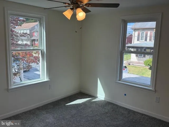a bathroom with a mirror and sink