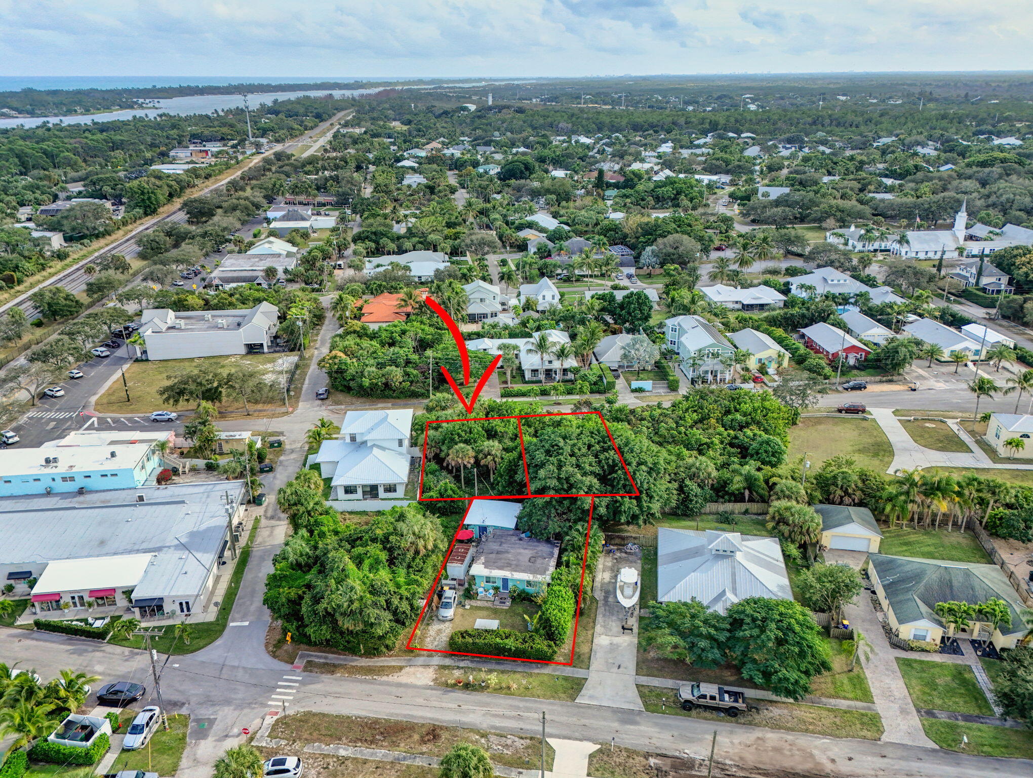 9156 Southeast Mars Street Hobe Sound, FL 33455 - Photo 13 of 25 an aerial view of multiple house