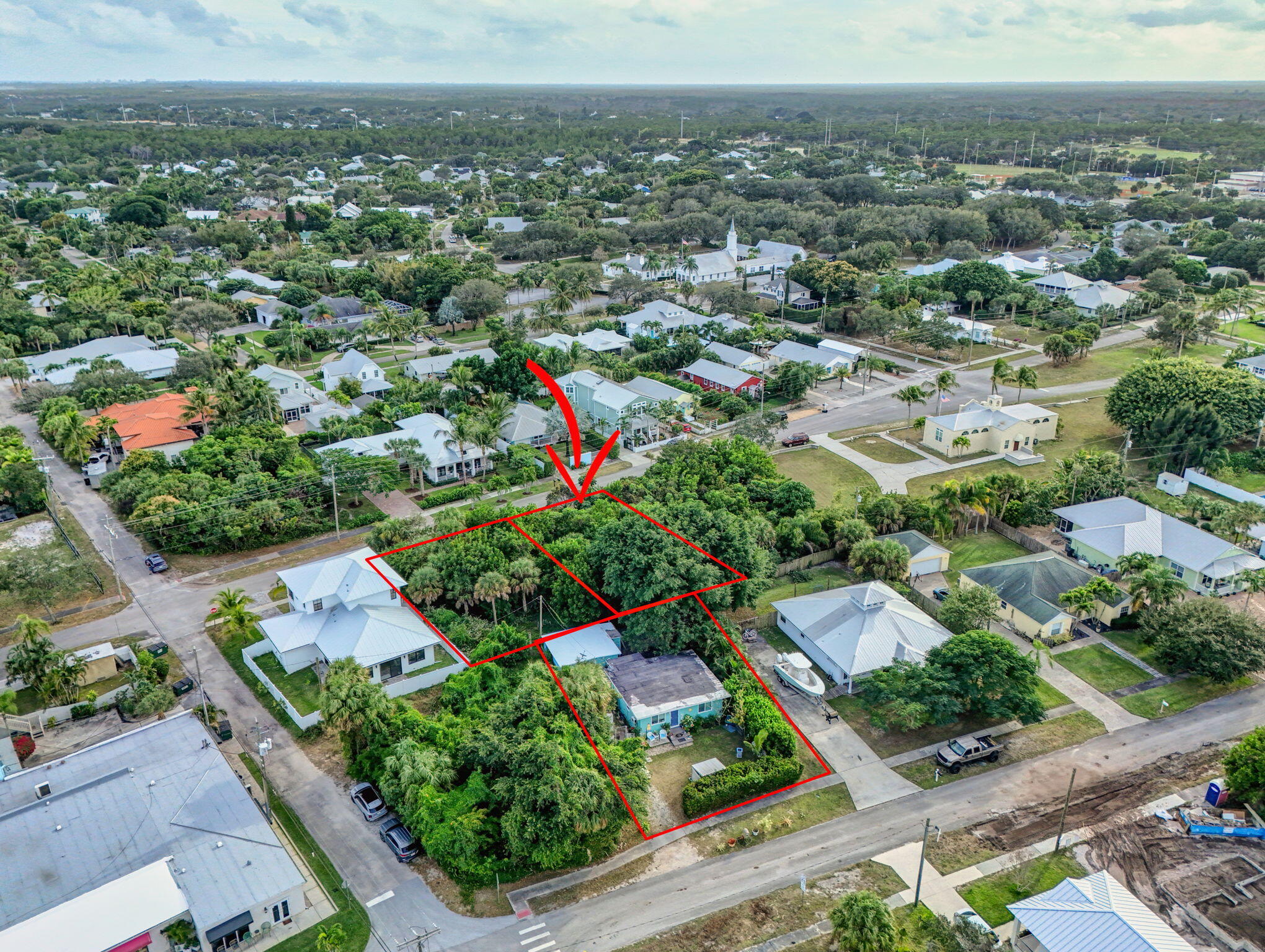 9156 Southeast Mars Street Hobe Sound, FL 33455 - Photo 6 of 25 an aerial view of multiple house