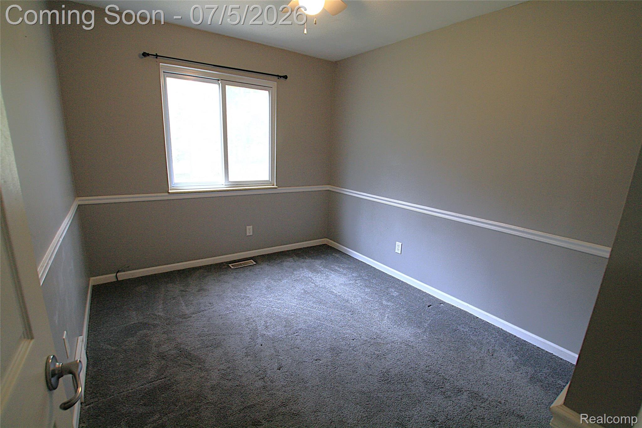12403 Willard Road Montrose, MI 48457 - Photo 21 of 30 Unfurnished room featuring carpet floors and a ceiling fan