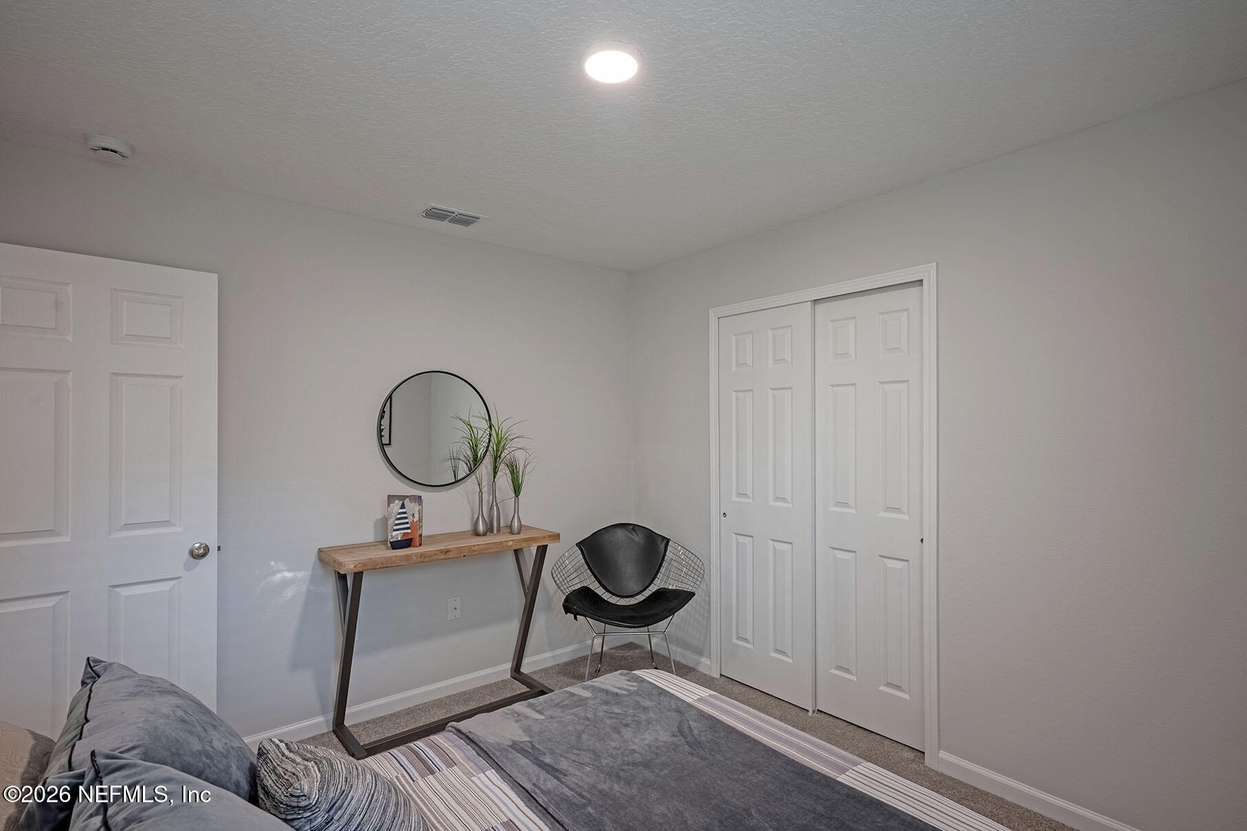 1639 Lakewood Road Jacksonville, FL 32207 - Photo 17 of 39 a living room with furniture a mirror and a window