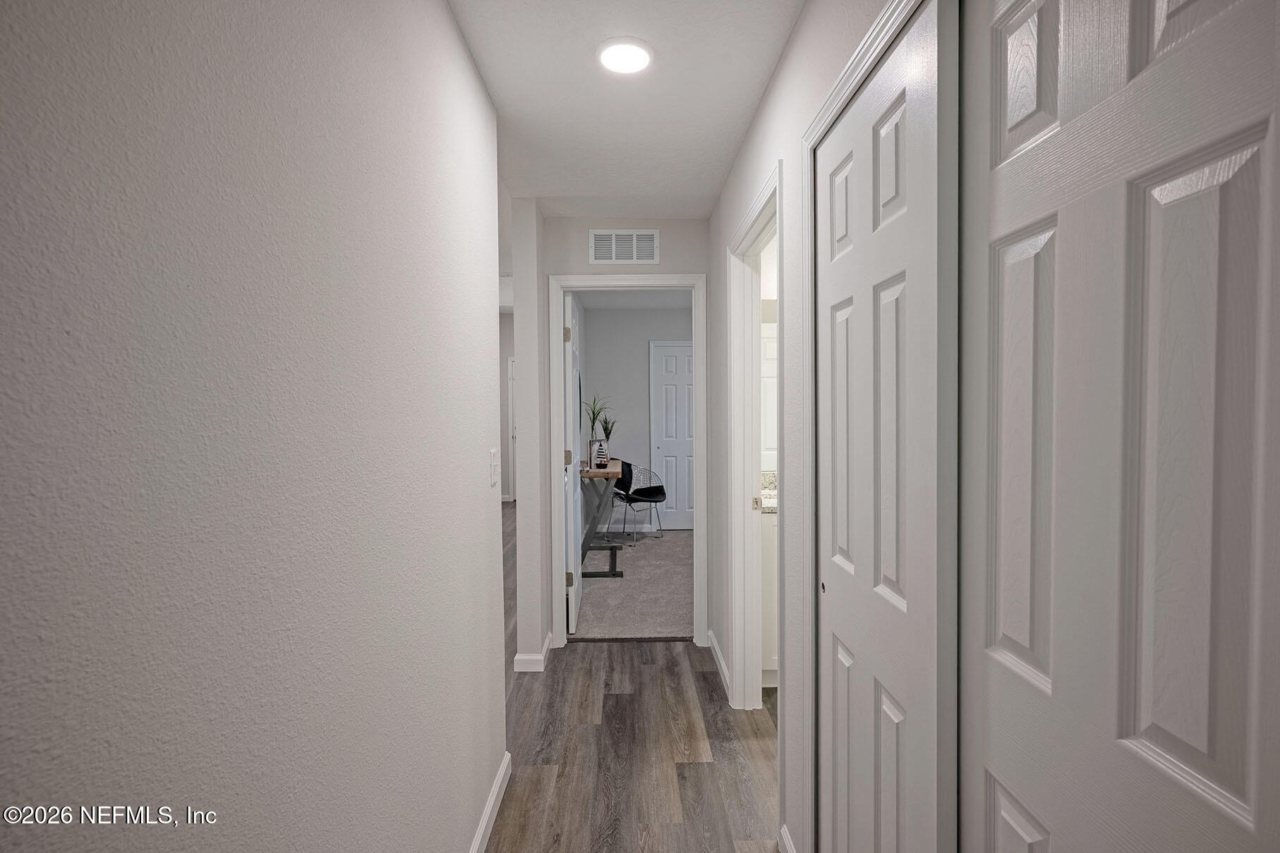1639 Lakewood Road Jacksonville, FL 32207 - Photo 24 of 39 a view of a hallway with wooden floor and closet area