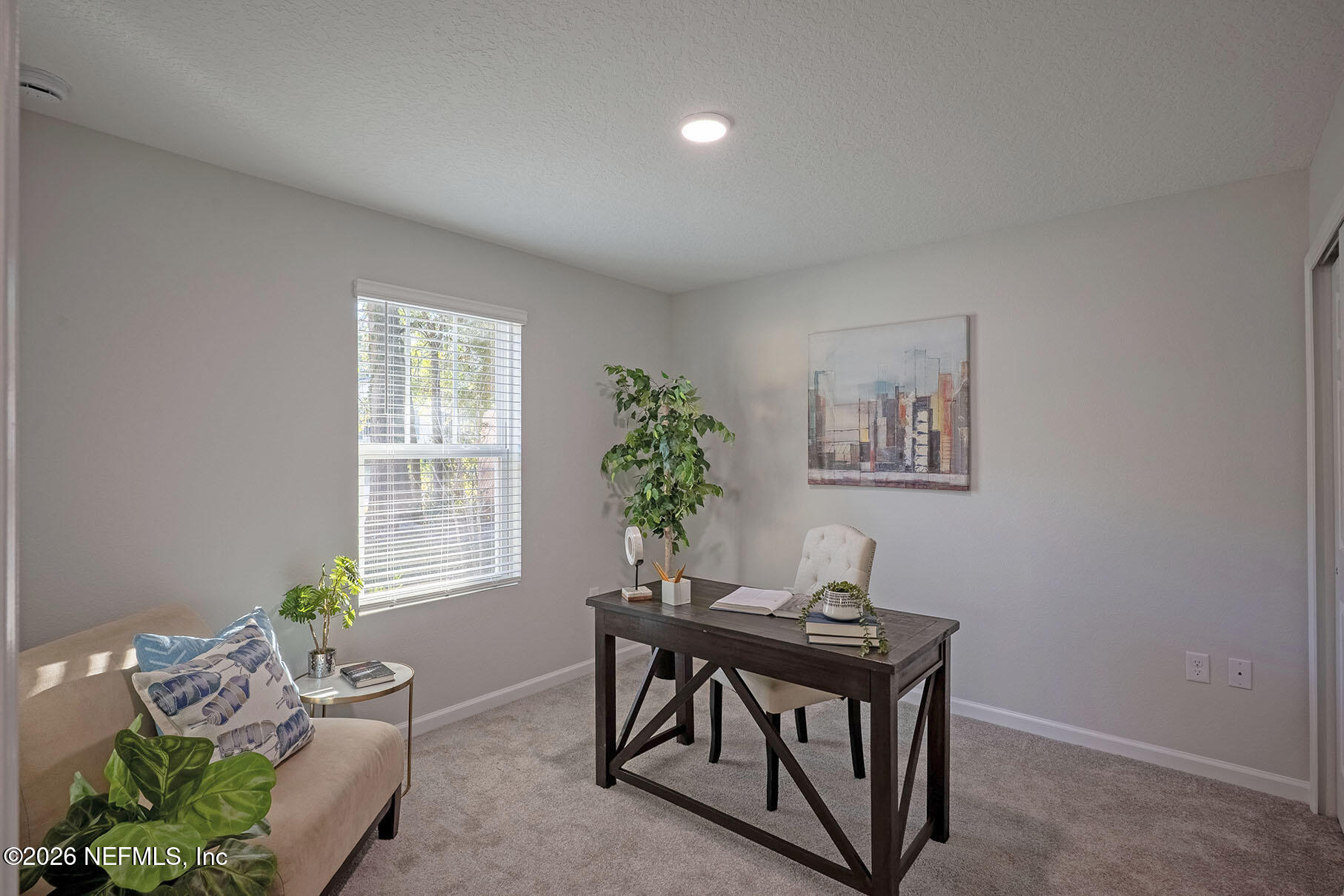 1639 Lakewood Road Jacksonville, FL 32207 - Photo 5 of 39 a living room with furniture and a potted plant